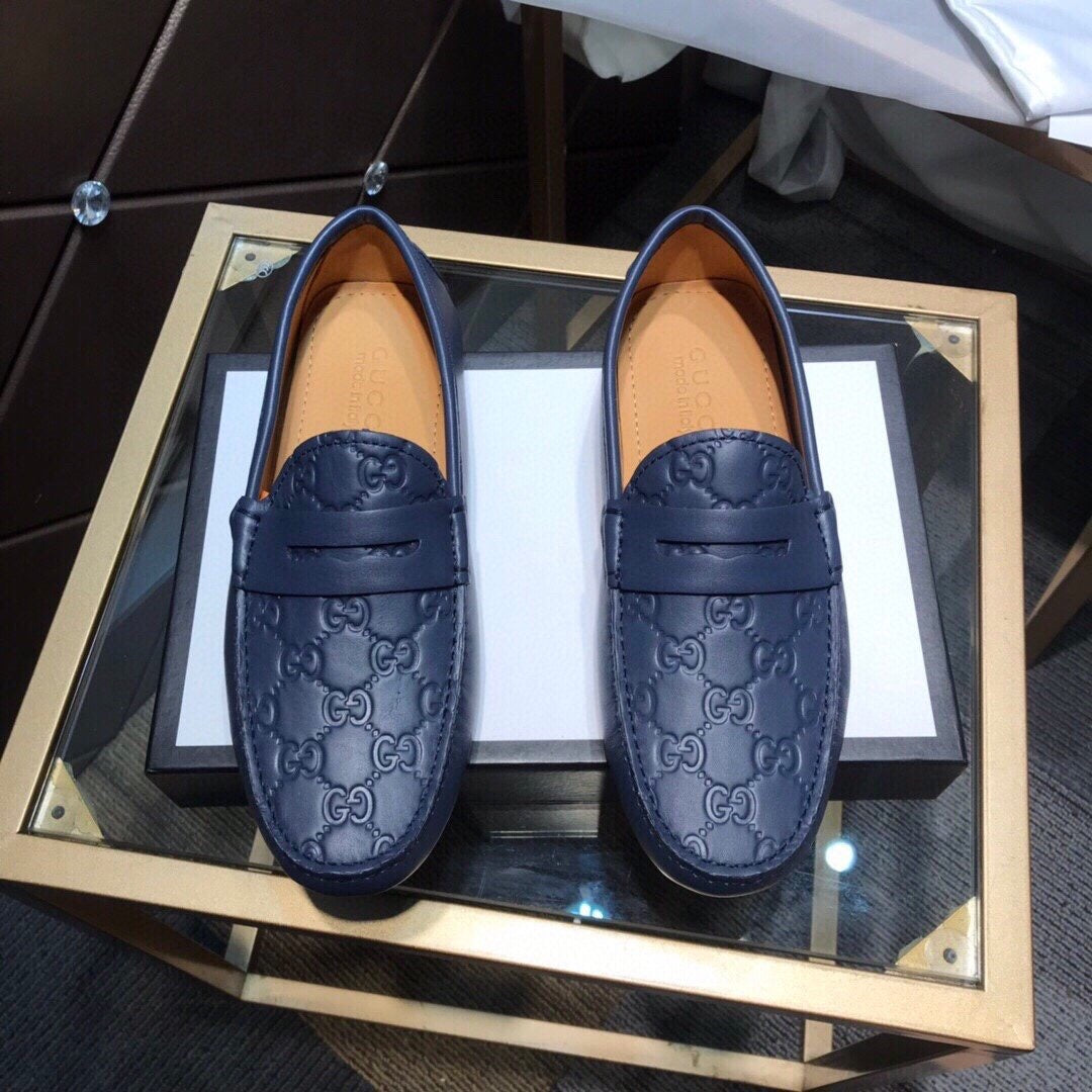 GG Embossed Loafers