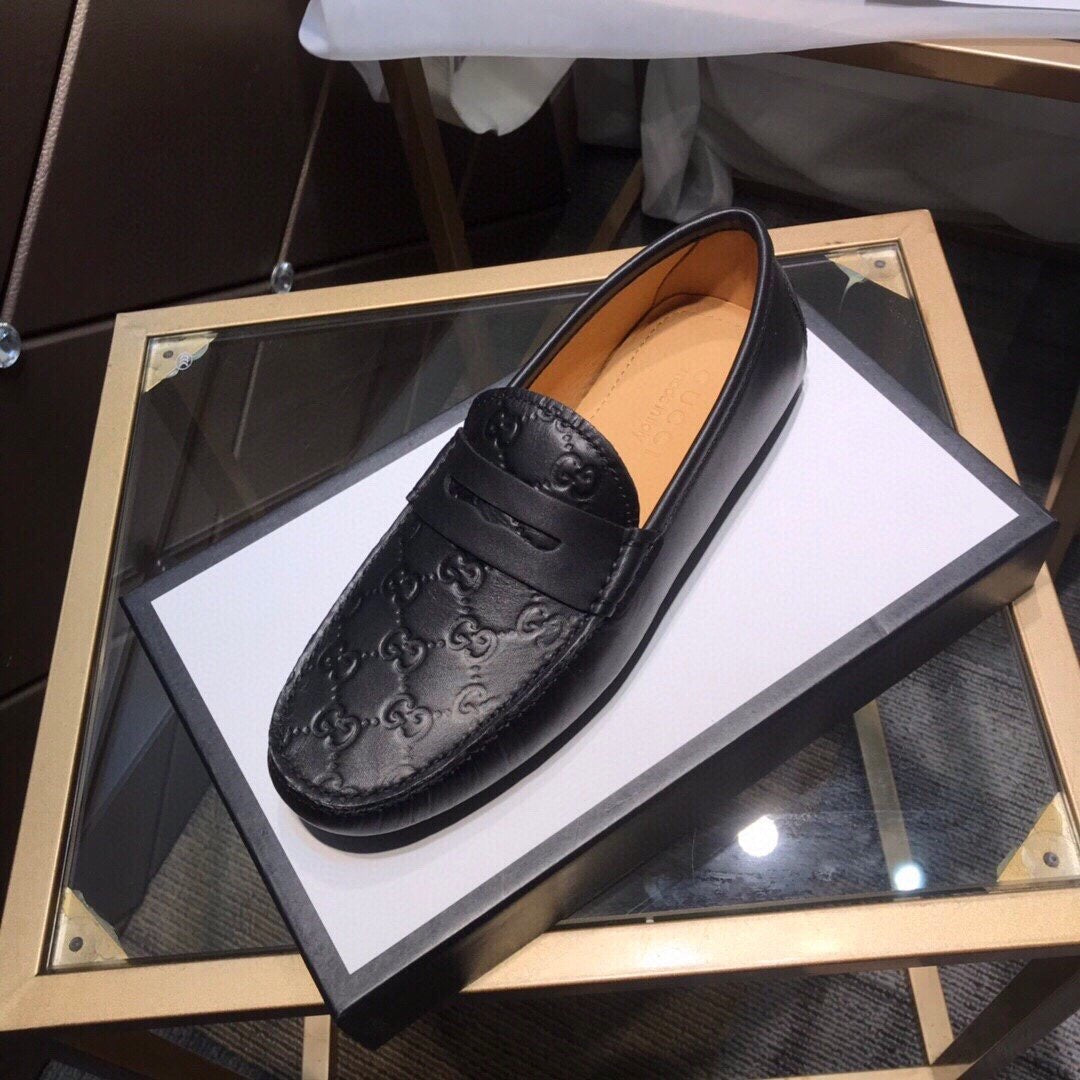 GG Embossed Loafers