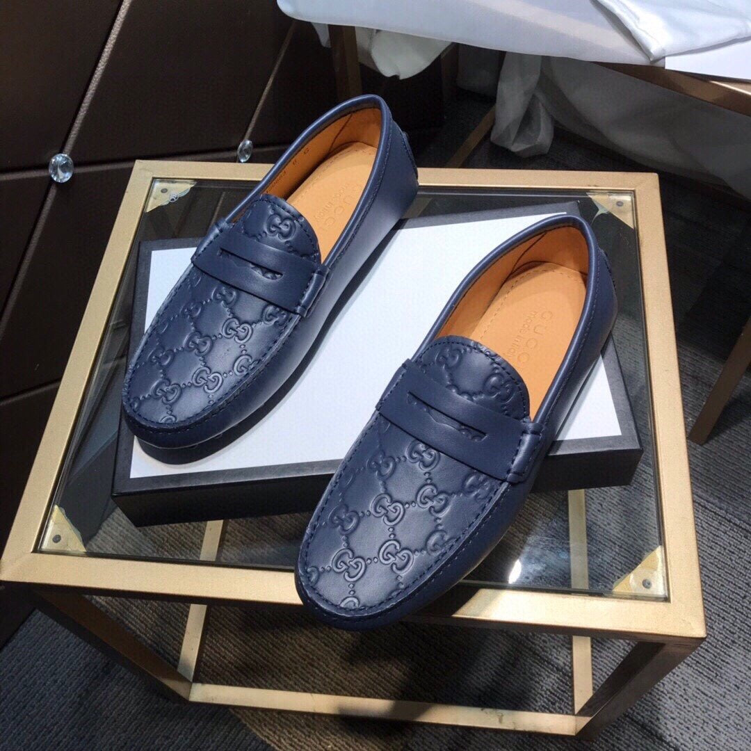 GG Embossed Loafers